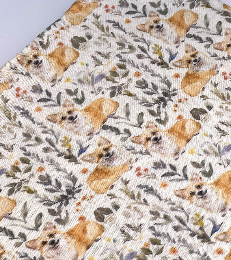 Scarf fabric with corgi dogs and floral patterns on a white background