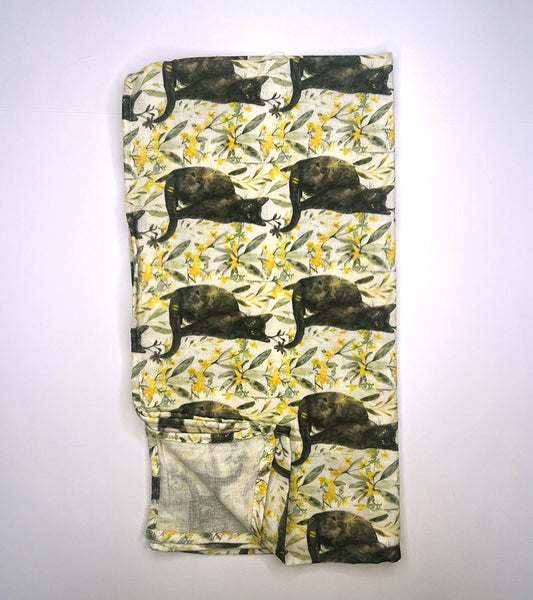 Scarf with black cat and yellow floral pattern on a white background