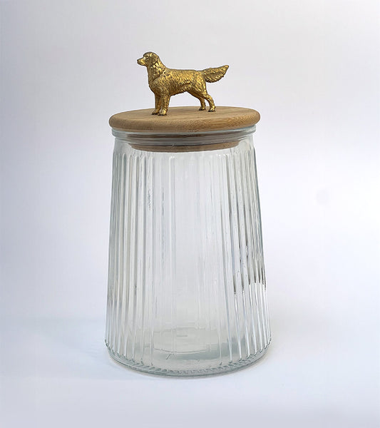 Clear glass jar with a wooden lid featuring a Golden Retriever dog figurine on a white background