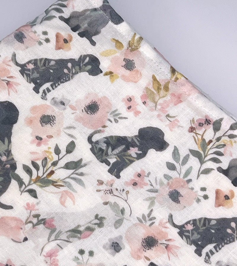 Scarf fabric with a floral and dog pattern 