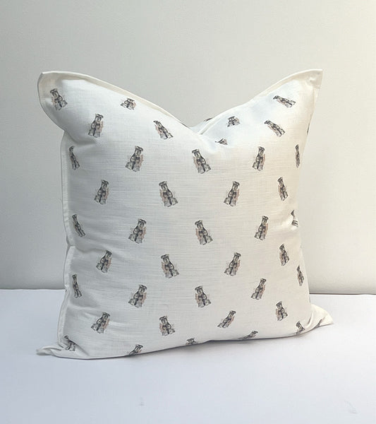 Schnauzer dog-pattern on a white cushion