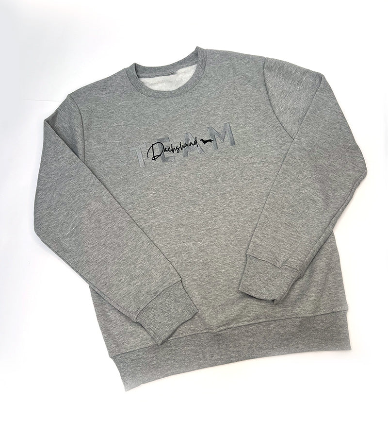 Gray sweatshirt with 'TEAM Dachshund' text and dog silhouette image on a plain background