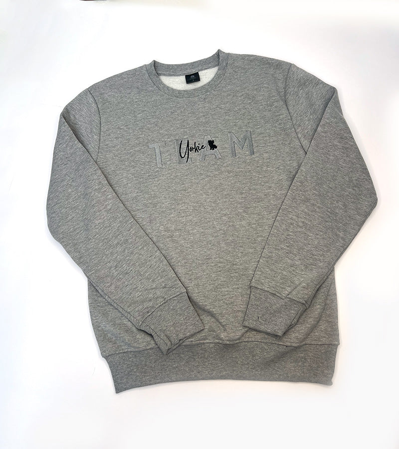 Gray sweatshirt with a 'Yorkie' text logo on a white background