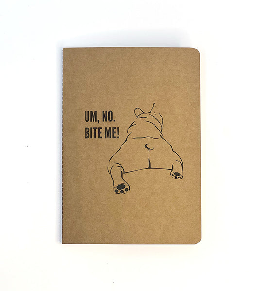 Brown notebook with 'Um, no. BITE ME!' text and a dog illustration on a white background